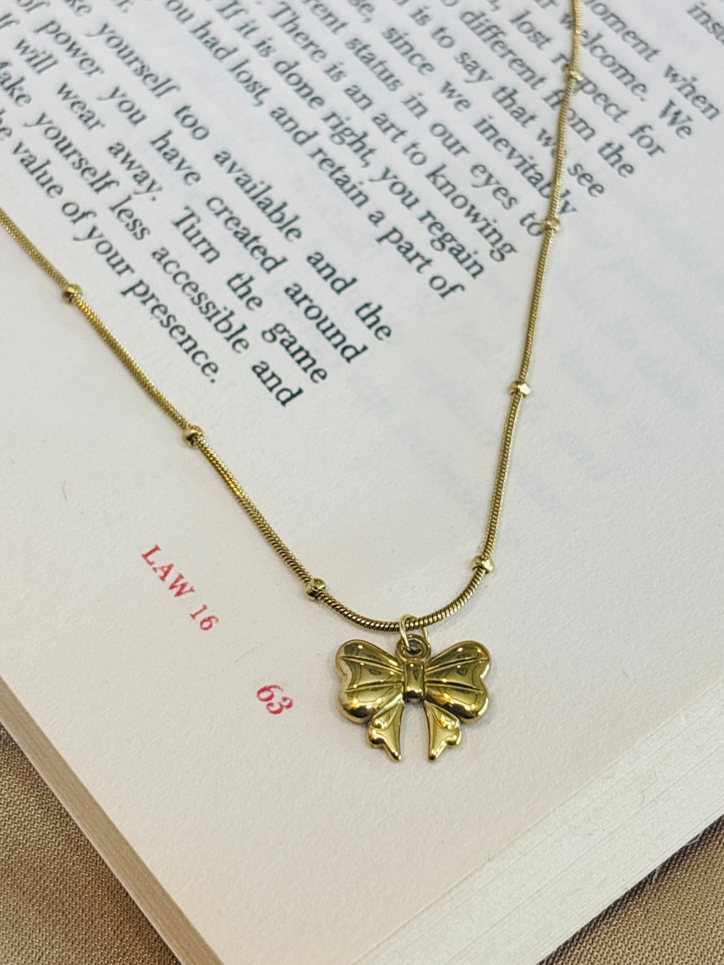 Golden Bow Charm Necklace