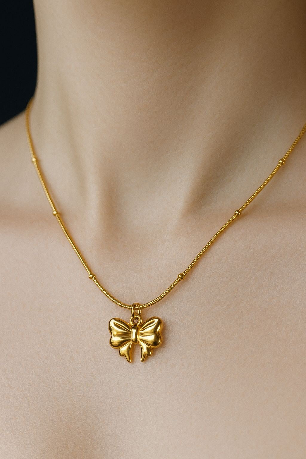 Golden Bow Charm Necklace